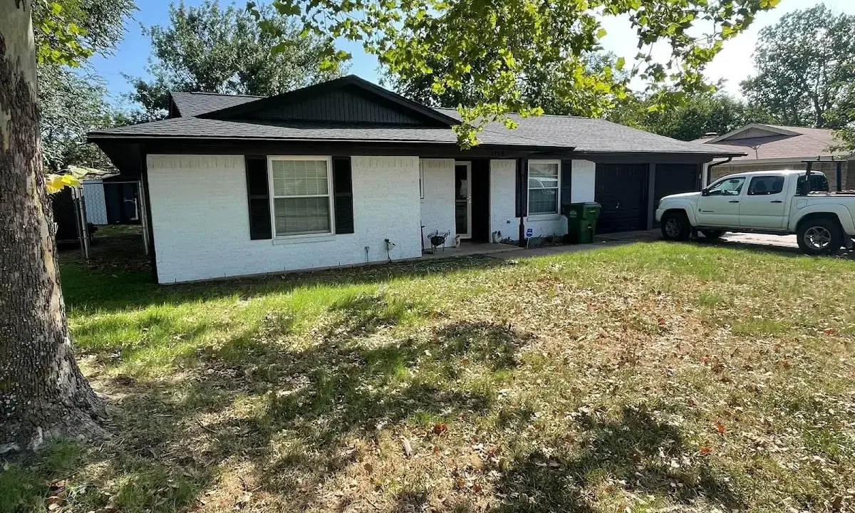 Professional roofing crew working on a residential roof in Las Vegas